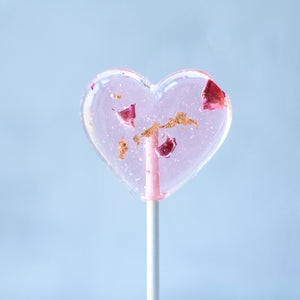 Heart lollipops with rose petals gold leaf bridal events gourmet candy